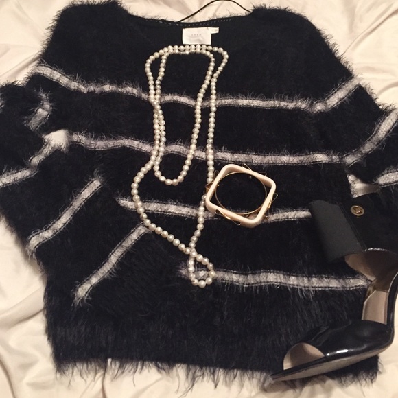 Stylish and cute black and white sweater