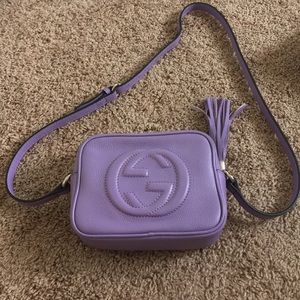 Purple cross body bag