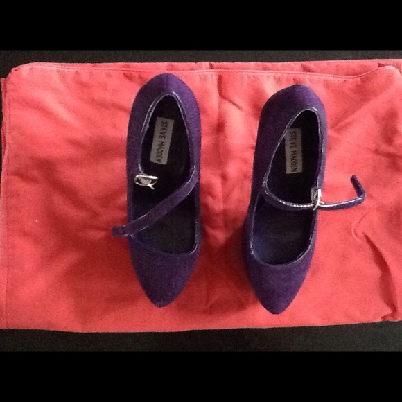 Steve Madden purple Mary Jane platform heels.