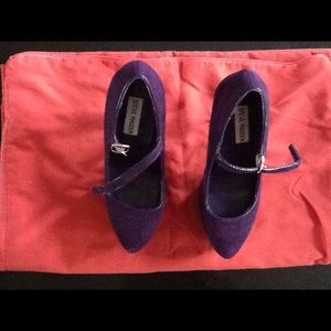 Steve Madden purple Mary Jane platform heels.