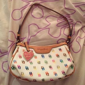 never been used Dooney & Bourke purse