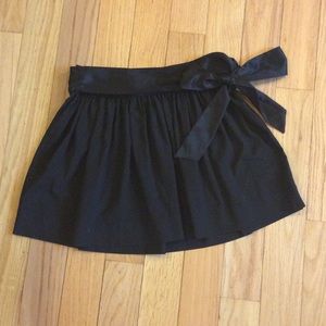 BCBG black flow skirt with side tie bow