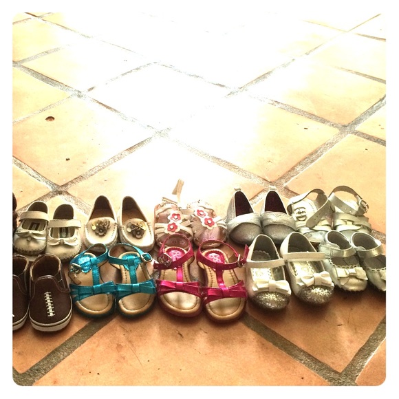 14 pairs of shoes ranging from size 2-5