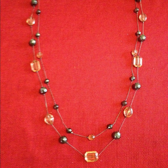 Long double strand gem necklace