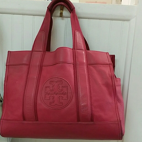 Tory Burch tote bag some stains on the inside.