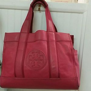 Tory Burch tote bag some stains on the inside.