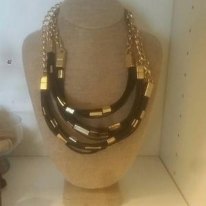 Black leather and gold BCBG necklace