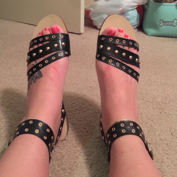 Black sandals.