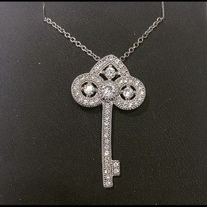 Heart key silver necklace with cz. Pave set.