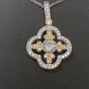 Silver pendant with yellow gold plated necklace