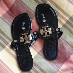 Black and gold Tory Burch sandals!