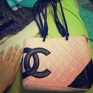 Knock off pink Chanel handbag