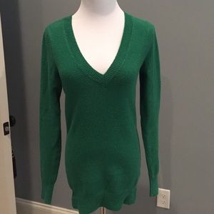 Green v-neck sweater