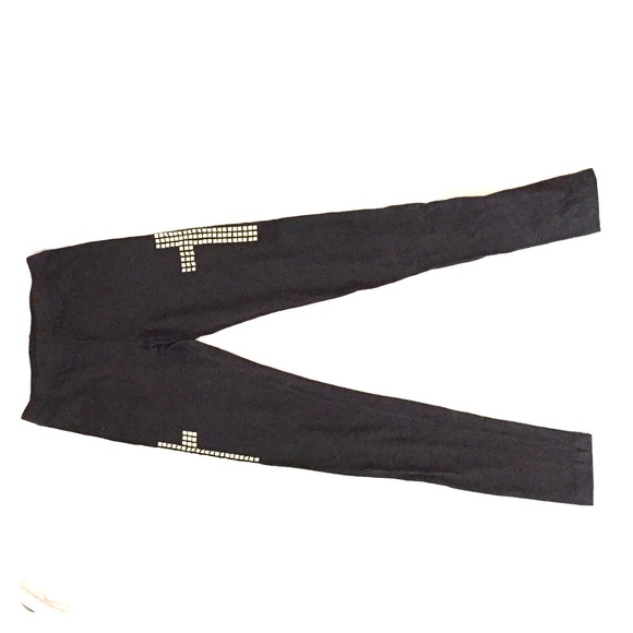 Black leggings with studded crosses