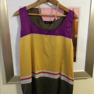 Multi- colored satin and knit top.