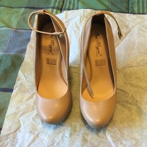 Pair of nude shoes