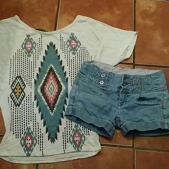 Tribal shirt with jean shorts.