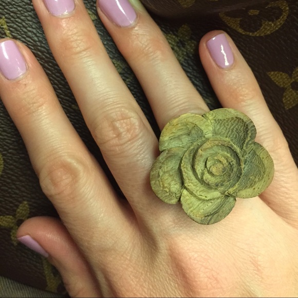 Awesome wood-carved flower power ring!