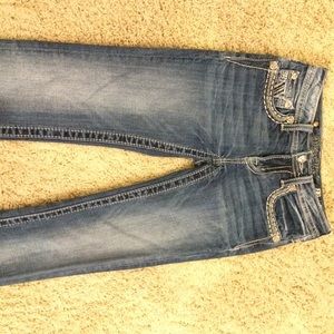 Buckle skinny jeans