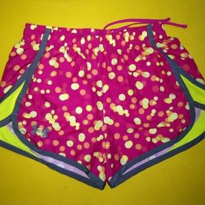 Under Armour running shorts.