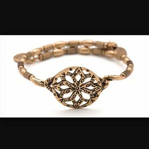 Alex and Ani Baraka wrap bracelet.