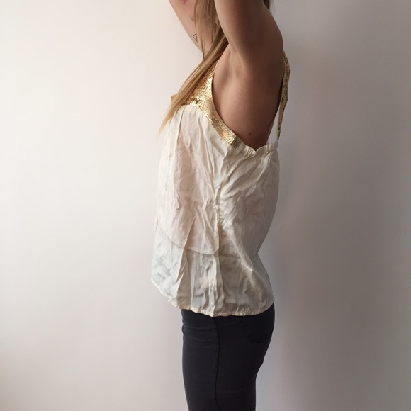 Top with gold sequins. Tiny whole in back. - Picture 3 of 3