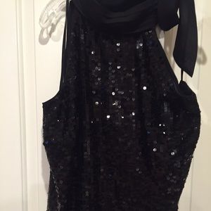 Beautiful sequin top with high neck.