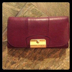 Purple coach checkbook wallet