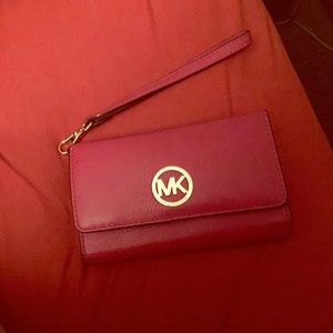 pink Michael Kors wristlet