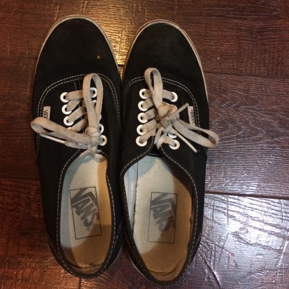 Thin black vans.