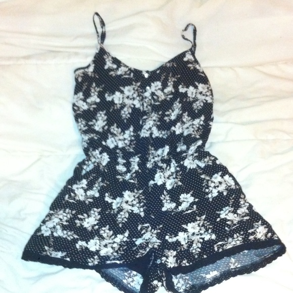 Black floral and polka dotted romper