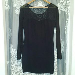Black bodycon mesh sleeve dress.