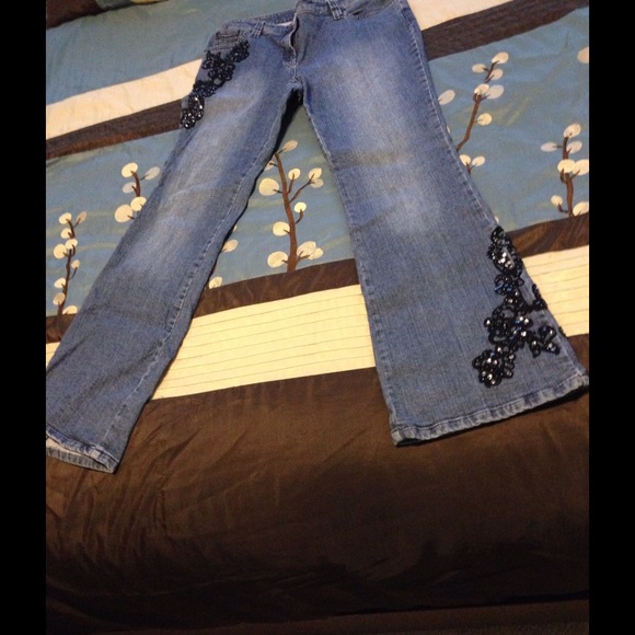 Black lace and sequin embellished denim jeans.