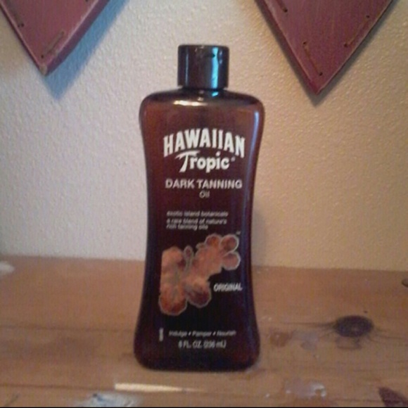 Dark tanning oil