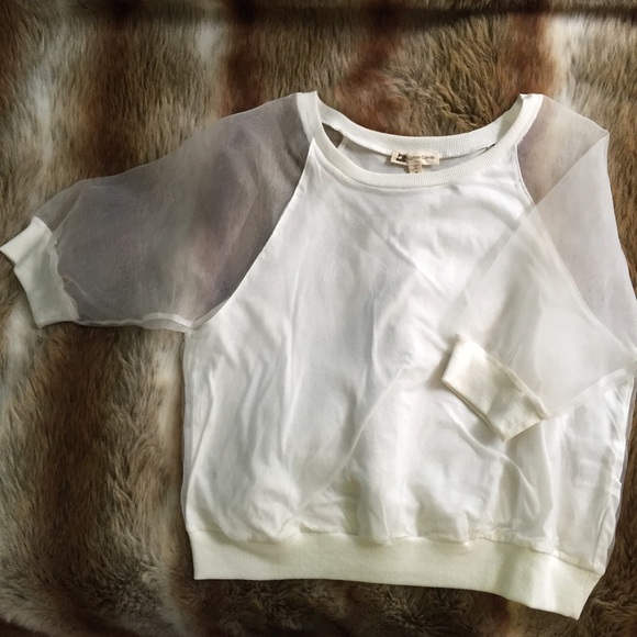 White shirt with sheer sleeves