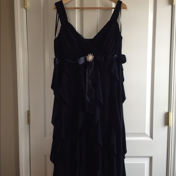 Navy blue ruffle long gown w/satin belt.