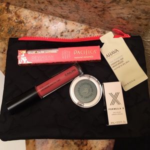 Ipsy bag full of deluxe samples