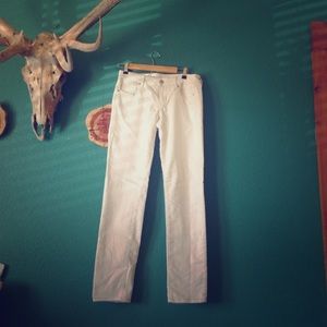 White denim skinny jeans.