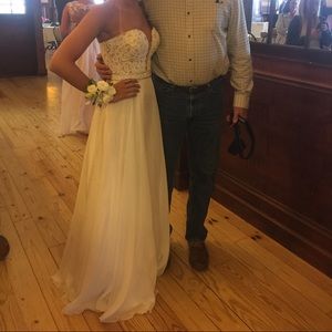 It's a gorgeous white Sherri hill lace prom dress!