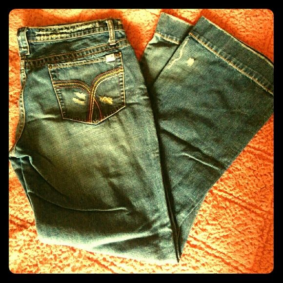 Distressed blue jeans