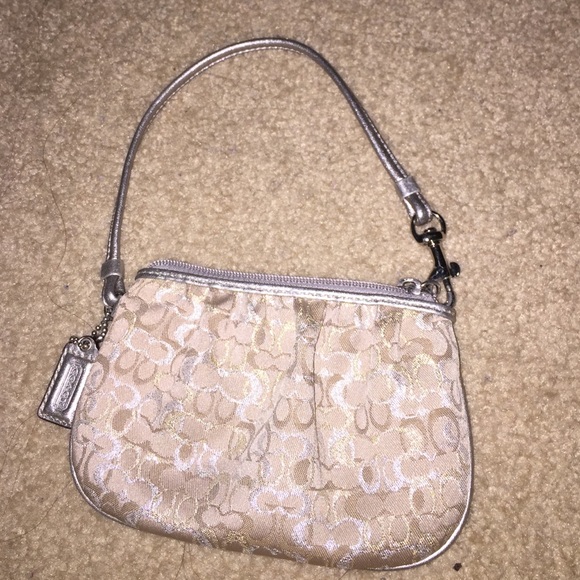 Gold sparky COACH wristlet
