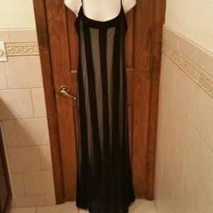 elegant black dress with mesh and a white underlay