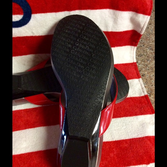 Red and silver Calvin Klein flip flips - Picture 2 of 3