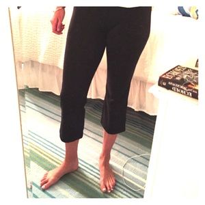 Black PrAna yoga plants with flare at bottom