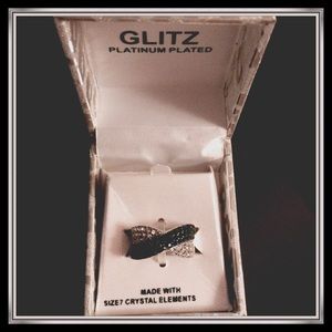 platinum plated crystal elements criss cross ring