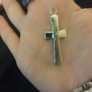 Cross piece that goes on a chain