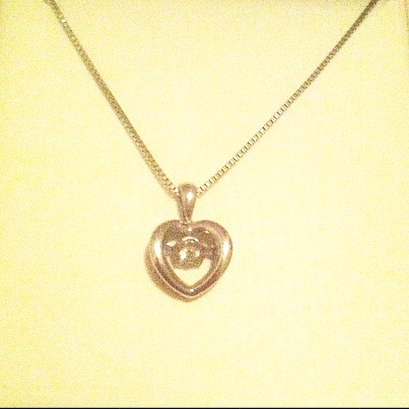 Final sale! Moving diamond silver heart necklace