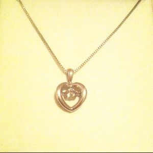 Final sale! Moving diamond silver heart necklace