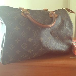 LV Speedy Bag, well loved and broken in.