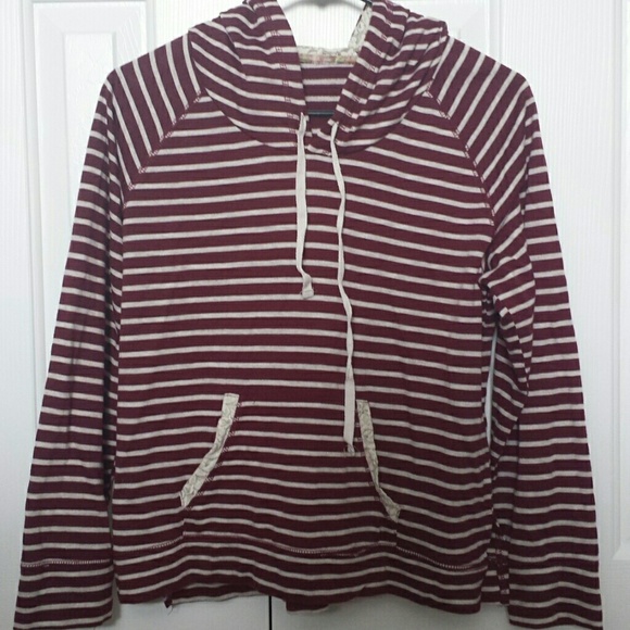 Maroon and cream striped pullover jacket.